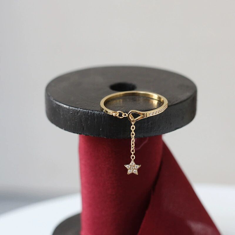 Small and Small Five-Pointed Star Ring With Tassels  