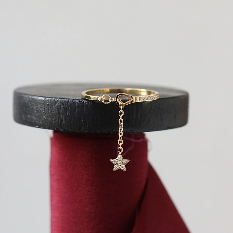 Small and Small Five-Pointed Star Ring With Tassels  